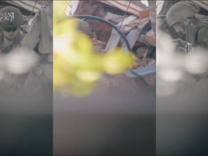 Al-Qassam targets and takes down two soldiers with a single bullet.