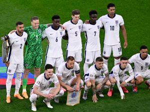 England's players pose for a team picture during the UEFA Euro 2024 Group C football match between Serbia and England at the Arena AufSchalke in Gelsenkirchen on June 16, 2024. (Photo by INA FASSBENDER / AFP)