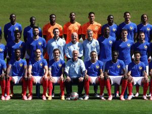 France's head coach Didier Deschamps (Bottom Centre), French forward and captain Kylian Mbappe (Bottom CR) and France's players and coaching staff pose for a photo ahead of a training session as part of the team's preparation for the UEFA Euro 2024 European football championships, in Clairefontaine-en-Yvelines, on June 7, 2024. (Photo by FRANCK FIFE / AFP)