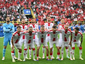 Georgia's players pose for a group photograph before the start of the UEFA Euro 2024 Group F football match between Turkey and Georgia at the BVB Stadion in Dortmund on June 18, 2024. (Photo by Alberto PIZZOLI / AFP)