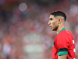 Morocco's defender Achraf Hakimi looks on during the international friendly football match between Morocco and Burkina Faso at the Stade Bollaert-Delelis in Lens, northern France, on September 12, 2023. The Royal Moroccan Football Federation (FRMF) has announced that the proceeds from the match will be donated to help support the victims of the recent earthquake that struck several regions in Morocco on September 8, 2023. (Photo by Ayoub Benkarroum / AFP)