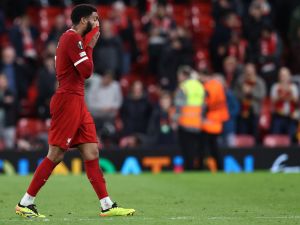 Liverpool's English defender #02 Joe Gomez reacts after the UEFA Europa League quarter-final first leg football match between Liverpool and Atalanta at Anfield in Liverpool, north west England on April 11, 2024. Atalanta won the match 3-0. (Photo by Darren Staples / AFP)