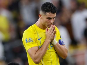 Nassr's Portuguese forward #07 Cristiano Ronaldo reacts during the penalty shootout of the King's Cup final match between Al-Nassr and Al-Hilal at the King Abdullah Sport City Stadium in Jeddah on May 31, 2024. (Photo by AFP)
