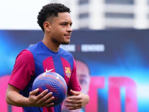 Brazilian forward Vitor Roque holds a ball during his official presentation as new player of FC Barcelona at the Joan Gamper training ground in Sant Joan Despi, near Barcelona, on January 5, 2024. (Photo by Pau BARRENA / AFP)