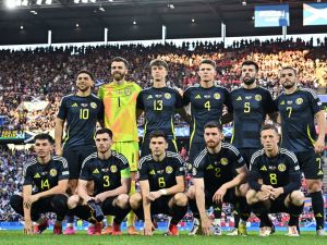 Scotland's players pose for a team photo prior to the UEFA Euro 2024 Group A football match between Scotland and Switzerland at the Cologne Stadium in Cologne on June 19, 2024. (Photo by JAVIER SORIANO / AFP)