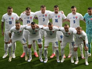 Slovakia's players pose for a team picture during the UEFA Euro 2024 Group E football match between Belgium and Slovakia at the Frankfurt Arena in Frankfurt am Main on June 17, 2024. (Photo by Angelos Tzortzinis / AFP)
