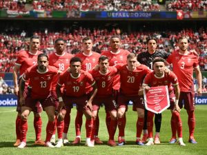 Switzerland players pose for the team photo prior to the UEFA Euro 2024 Group A football match between Hungary and Switzerland at the Cologne Stadium in Cologne on June 15, 2024. (Photo by Angelos Tzortzinis / AFP)