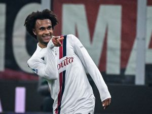 Bologna's Dutch forward #9 Joshua Zirkzee celebrates after scoring the opening goal during the Italian Serie A football match between AC Milan and Bologna at the San Siro Stadium, in Milan on January 27, 2024. (Photo by Piero CRUCIATTI / AFP)