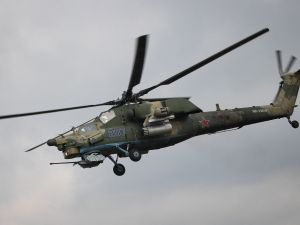A Mil Mi-28 Night Hunter military helicopter takes part in a military aviation competition in Russia's Krasnodar region on March 28, 2019. / AFP / VITALIY TIMKIV Russia