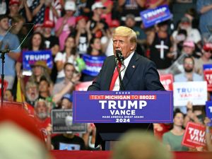 Former US President and 2024 presidential nominee Donald Trump speaks during a campaign rally with US Senator and vice presidential nominee J.D. Vance at Van Andel Arena in Grand Rapids, Michigan, on July 20, 2024. (Photo by Jim WATSON / AFP) Trump