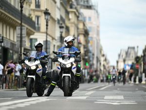 French police officers patrol on motorcycles in central Paris, on July 23, 2024, ahead of Paris 2024 Olympic and Paralympic Games. (Photo by Natalia KOLESNIKOVA / AFP) Paris