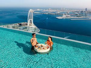 Swim Under The Stars at Address Beach Resort’s New Exquisite Night Pool Experience