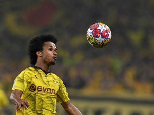 Dortmund's German forward #27 Karim Adeyemi heads the ball during the UEFA Champions League final football match between Borussia Dortmund and Real Madrid, at Wembley stadium, in London, on June 1, 2024. (Photo by Glyn KIRK / AFP)