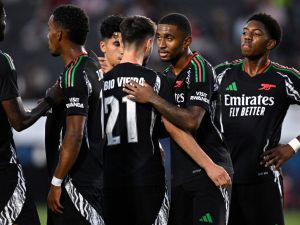 Fabio Vieira #21 of Arsenal FC is congratulated by teammates after scoring a goal against AFC Bournemouth during the first half at Dignity Health Sports Park on July 24, 2024 in Carson, California. Orlando Ramirez/Getty Images/AFP (Photo by Orlando Ramirez / GETTY IMAGES NORTH AMERICA / Getty Images via AFP)
