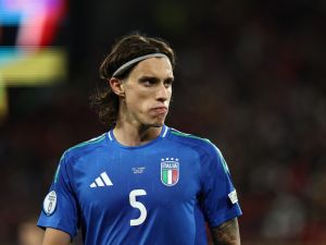 Italy's defender #05 Riccardo Calafiori looks on during the UEFA Euro 2024 Group B football match between Italy and Albania at the BVB Stadion in Dortmund on June 15, 2024. (Photo by FRANCK FIFE / AFP)