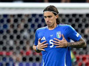 Italy's defender #05 Riccardo Calafiori reacts during the UEFA Euro 2024 Group B football match between Italy and Albania at the BVB Stadion in Dortmund on June 15, 2024. (Photo by INA FASSBENDER / AFP)