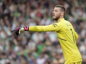 Manchester United's Spanish goalkeeper David de Gea gestures during the UEFA Europa League last 16 second leg football match between Real Betis and Manchester United at the Benito Villamarin stadium in Seville on March 16, 2023. (Photo by CRISTINA QUICLER / AFP)