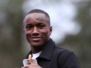 Fance's forward Moussa Diaby gestures as he arrives to take part in the French team's preparation for upcoming friendly football matches in Clairefontaine-en-Yvelines on March 18, 2024. (Photo by FRANCK FIFE / AFP)