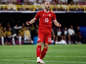 Denmark's midfielder #10 Christian Eriksen reacts to a missed chance during the UEFA Euro 2024 round of 16 football match between Germany and Denmark at the BVB Stadion Dortmund in Dortmund on June 29, 2024. (Photo by KENZO TRIBOUILLARD / AFP)