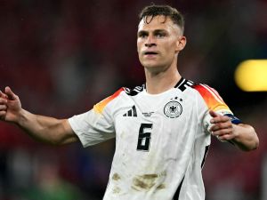 Germany's defender #06 Joshua Kimmich reacts during the UEFA Euro 2024 round of 16 football match between Germany and Denmark at the BVB Stadion Dortmund in Dortmund on June 29, 2024. (Photo by OZAN KOSE / AFP)