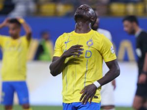 Nassr's Senegalese Forward #10 Sadio Mane reacts after missing a penalty during the Saudi Pro League football match between Al-Nassr and Al-Feiha at Al -Awwal Stadium in Riyadh on April 19, 2024. (Photo by Fayez NURELDINE / AFP)