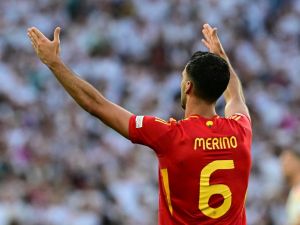 Spain's midfielder #06 Mikel Merino celebrates scoring his team's second goal during the UEFA Euro 2024 quarter-final football match between Spain and Germany at the Stuttgart Arena in Stuttgart on July 5, 2024. (Photo by Tobias SCHWARZ / AFP)