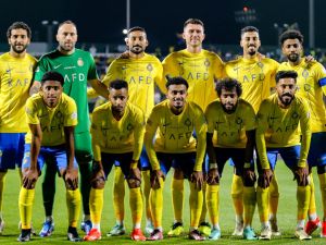 Nassr's starting eleven pose for the group photo before the start of the Saudi Pro League football match between Damac FC and Al-Nassr FC at Prince Sultan bin Abdulaziz Sports City stadium in Abha on April 5, 2024. (Photo by Mohammed ALSHEHRI / AFP)