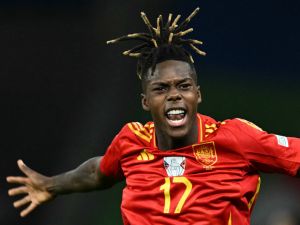 Spain's midfielder #17 Nico Williams celebrates scoring his team's first goal during the UEFA Euro 2024 final football match between Spain and England at the Olympiastadion in Berlin on July 14, 2024. (Photo by INA FASSBENDER / AFP)