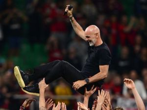 AC Milan's Italian coach Stefano Pioli is celebrated by AC Milan’s players at the end of the Italian Serie A football match between AC Milan and Salernitana at San Siro Stadium, in Milan on May 25, 2024. (Photo by MARCO BERTORELLO / AFP)