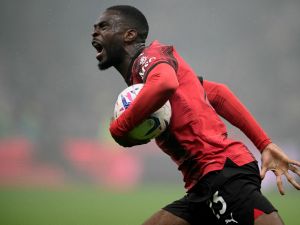 AC Milan's English defender #23 Fikayo Tomori celebrates scoring his team's first goal during the Italian Serie A football match between AC Milan and Inter Milan at the San Siro Stadium in Milan on April 22, 2024. (Photo by Marco BERTORELLO / AFP)