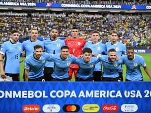 Uruguay's players pose for pictures ahead of the Conmebol 2024 Copa America tournament quarter-final football match between Uruguay and Brazil at Allegiant Stadium in Las Vegas, Nevada on July 6, 2024. (Photo by Robyn Beck / AFP)