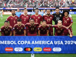 Venezuela players pose for a team photo ahead of the Conmebol 2024 Copa America tournament group B football match between Venezuela and Mexico at SoFi Stadium in Inglewood, California on June 26, 2024. (Photo by Patrick T. Fallon / AFP)