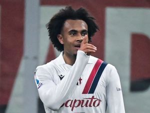 Bologna's Dutch forward #9 Joshua Zirkzee celebrates after scoring the opening goal during the Italian Serie A football match between AC Milan and Bologna at the San Siro Stadium, in Milan on January 27, 2024. (Photo by Piero CRUCIATTI / AFP)