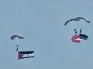  group of young guys who were skydiving and flying the Palestinian flag in Aqaba