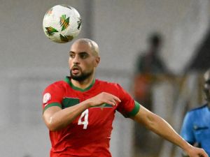 Morocco's midfielder #4 Sofyan Amrabat heads the ball during the Africa Cup of Nations (CAN) 2024 group F football match between Morocco and Tanzania at Stade Laurent Pokou in San Pedro on January 17, 2024. (Photo by SIA KAMBOU / AFP)