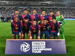 FC Barcelona poses for a team photo before the start of a 2024 FC Series pre-season friendly football match between FC Barcelona and Manchester City at Camping World Stadium in Orlando, Florida, on July 30, 2024. (Photo by CHANDAN KHANNA / AFP)