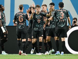 Bayern Munich’s players celebrate a goal during a friendly football match between Tottenham Hotspur and Bayern Munich at the Seoul World Cup Stadium in Seoul on August 3, 2024. (Photo by ANTHONY WALLACE / AFP)