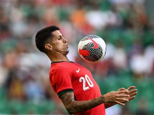 Portugal's defender #20 Joao Cancelo controls the ball during the International friendly match between Portugal and Finland at Alvalade stadium in Lisbon on June 4, 2024, ahead of the UEFA Euro 2024 football tournament in Germany. (Photo by PATRICIA DE MELO MOREIRA / AFP)