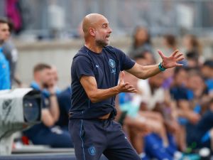 Manchester City's Spanish manager Pep Guardiola directs his team during the second half of the pre-season club friendly football match between Manchester City and Chelsea at Ohio Stadium in Columbus, Ohio, August 3, 2024. (Photo by KAMIL KRZACZYNSKI / AFP)