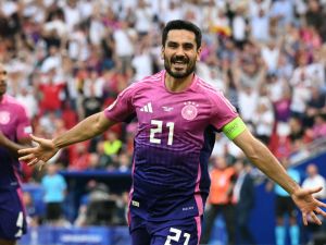 Germany's midfielder #21 Ilkay Gundogan celebrates scoring his team's second goal during the UEFA Euro 2024 Group A football match between Germany and Hungary at the Stuttgart Arena in Stuttgart on June 19, 2024. (Photo by THOMAS KIENZLE / AFP)