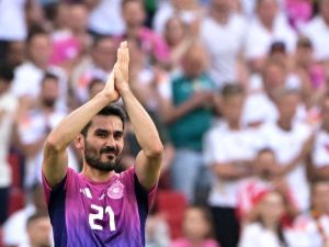 Germany's midfielder #21 Ilkay Gundogan reacts as he is substituted during the UEFA Euro 2024 Group A football match between Germany and Hungary at the Stuttgart Arena in Stuttgart on June 19, 2024. (Photo by DAMIEN MEYER / AFP)