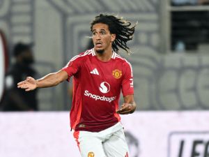 Former Manchester United midfielder #46 Hannibal Mejbri gestures during the pre-season club friendly football match between Manchester United and Real Betis at SnapDragon Stadium in San Diego, California, on July 31, 2024. (Photo by Patrick T. Fallon / AFP)