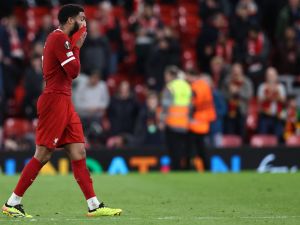 Liverpool's English defender #02 Joe Gomez reacts after the UEFA Europa League quarter-final first leg football match between Liverpool and Atalanta at Anfield in Liverpool, north west England on April 11, 2024. Atalanta won the match 3-0. (Photo by Darren Staples / AFP)