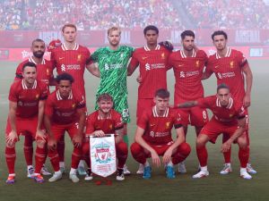 Liverpool's players pose for pictures ahead of the pre-season club friendly football match between Arsenal FC and Liverpool FC at Lincoln Financial Field in Philadelphia, Pennsylvania, on July 31, 2024. (Photo by Charly TRIBALLEAU / AFP)