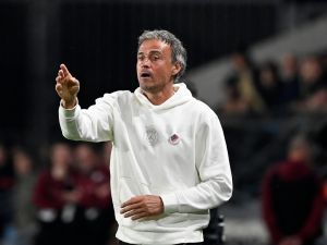 Paris Saint-Germain's Spanish headcoach Luis Enrique shouts instructions to his players from the touchline during the French L1 football match between FC Metz and Paris Saint-Germain (PSG) at the Saint-Symphorien Stadium in Longeville-les-Metz, eastern France, on May 19, 2024. (Photo by Jean-Christophe VERHAEGEN / AFP)
