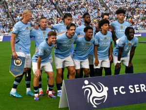 Manchester players pose for a team photo ahead of the 2024 FC Series pre-season friendly football match between Manchester City and Celtic at the Kenan Memorial Stadium in Chapel Hill, North Carolina, July 23, 2024. (Photo by Peter Zay / AFP)