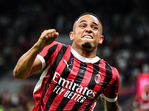 AC Milan's Swiss forward #17 Noah Okafor celebrates scoring his team's second goal during the Italian Serie A football match between AC Milan and Torino at the San Siro Stadium in Milan, on August 17, 2024. (Photo by Piero CRUCIATTI / AFP)