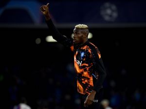 Napoli's Nigerian forward #09 Victor Osimhen warms up before the UEFA Champions League round of 16 first Leg football match between Napoli and Barcelona at the Diego-Armando-Maradona stadium in Naples on February 21, 2024. (Photo by Filippo MONTEFORTE / AFP)