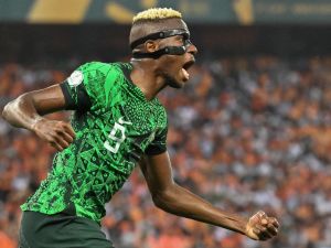 Nigeria's forward #9 Victor Osimhen reacts during the Africa Cup of Nations (CAN) 2024 final football match between Ivory Coast and Nigeria at Alassane Ouattara Olympic Stadium in Ebimpe, Abidjan on February 11, 2024. (Photo by Issouf SANOGO / AFP)