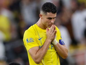 Nassr's Portuguese forward #07 Cristiano Ronaldo reacts during the penalty shootout of the King's Cup final match between Al-Nassr and Al-Hilal at the King Abdullah Sport City Stadium in Jeddah on May 31, 2024. (Photo by AFP)